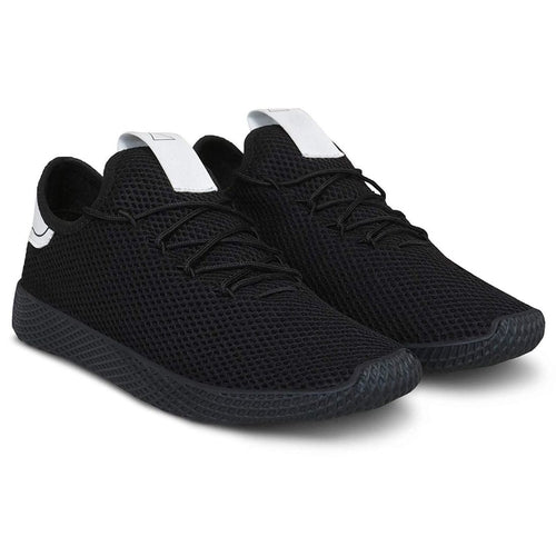Black sneakers with white accents on a white background