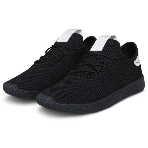 Black sneakers with white accents on a white background