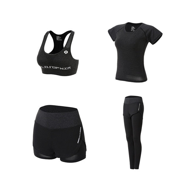 Set of black athletic wear including a sports bra, t-shirt, shorts, and leggings on a white background.