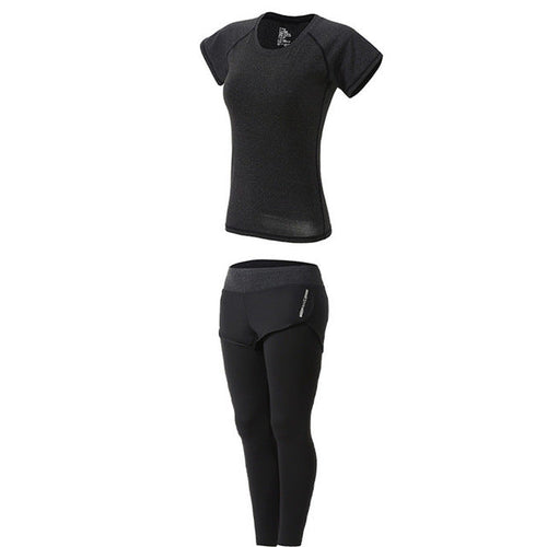 Black athletic outfit with short-sleeve top and leggings on a white background